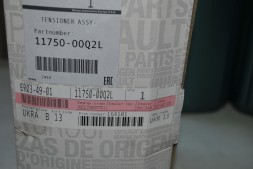 Натяжний механізм привідного ременя