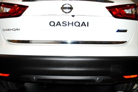 KE7914E52C Nissan Накладка на край заднего бампера (J11) KE7914E520IC Nissan