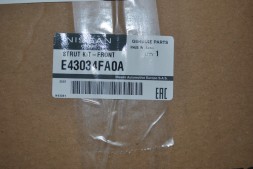 Амортизатор передній лівий