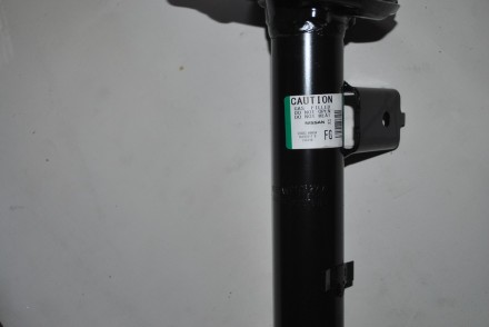 E43036UA3A Nissan Амортизатор передній лівий