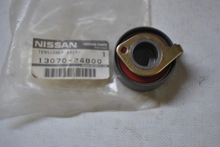 1307024B00 Nissan Натяжитель ремня ГРМ  MA10S