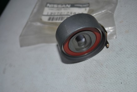 1307024B00 Nissan Натяжитель ремня ГРМ  MA10S