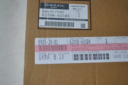 628906US0A Nissan Емблема передня