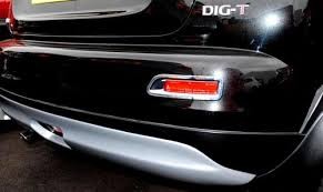 KE7911K030 Nissan Хромированные накладки задних отражателей (F15) KE7911K030 Nissan