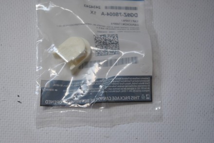 DG9Z7S004A Ford ЗАХИСНА КРИШКА ТРОСУ ПЕРЕМИКАННЯ ПЕРЕДАЧ АКПП